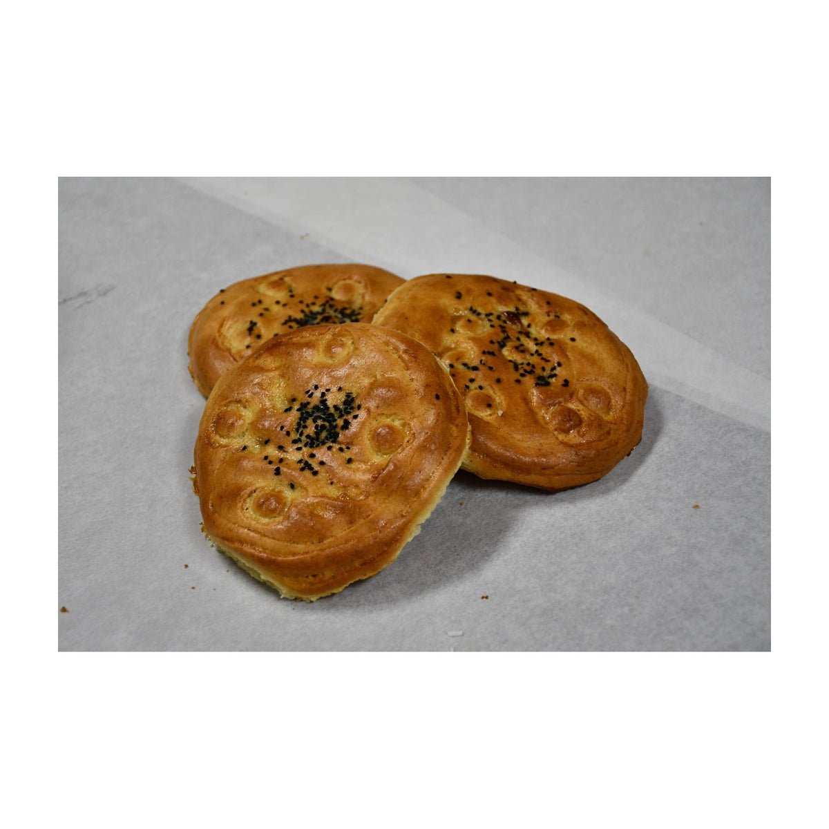 Amber tandoori cookies in a bakery pack