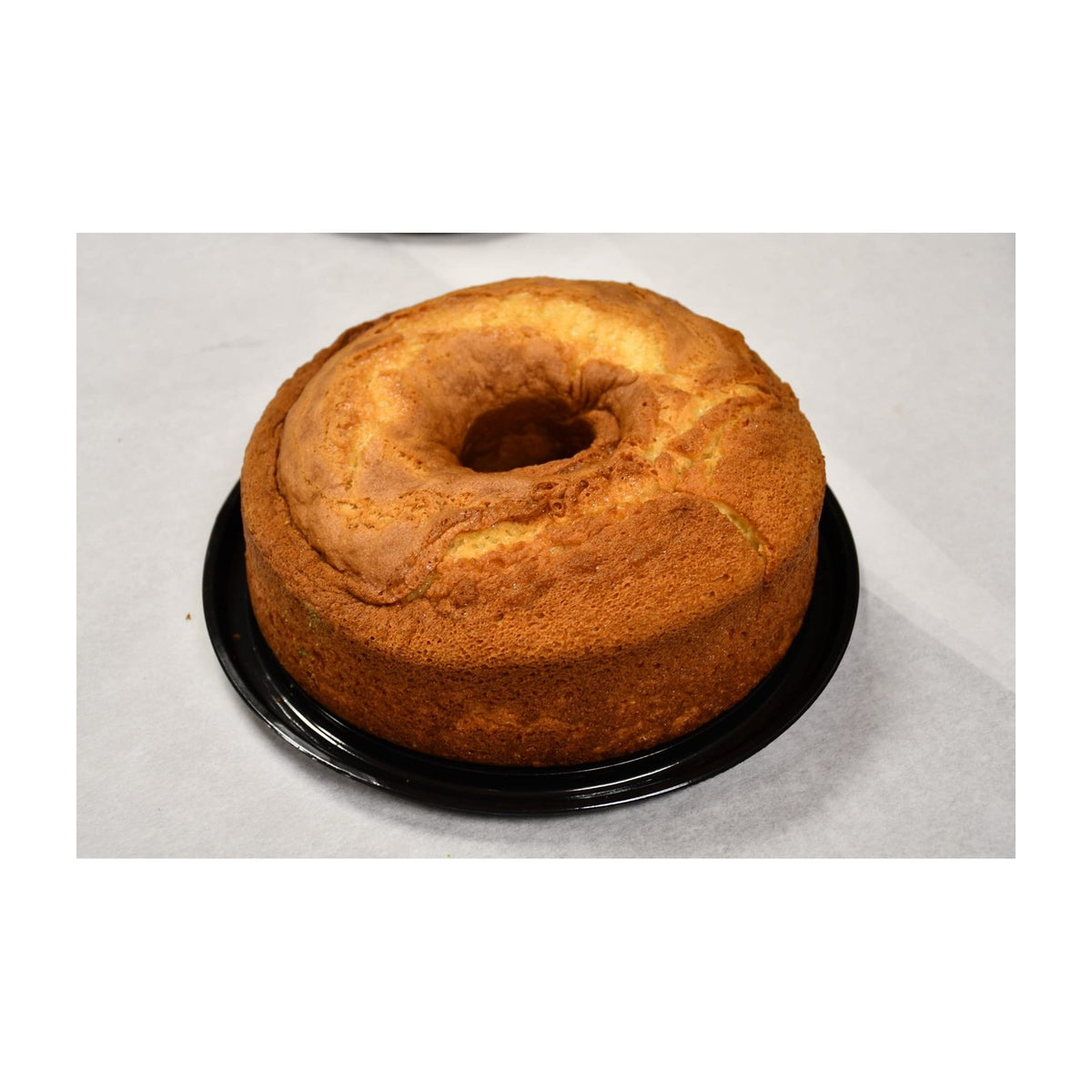 Amber vanilla cake in a bakery package